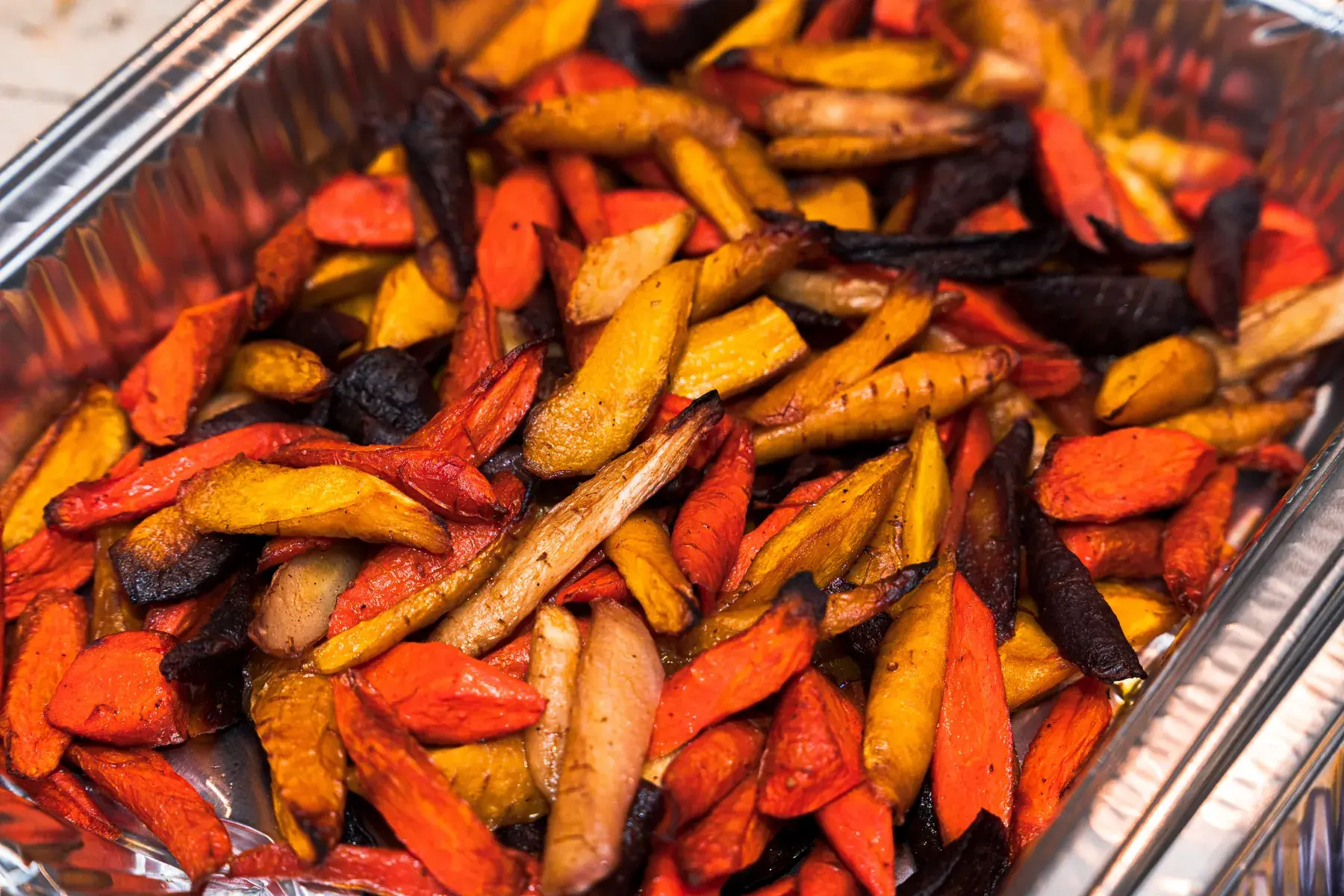 Roasted vegetable catering spread styled for a corporate gathering by Dragonfly Catering