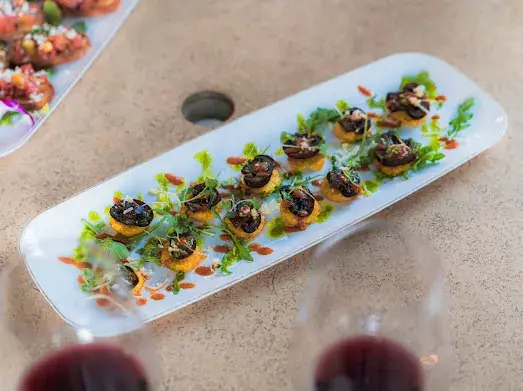 Bite-size canapes arranged for guests at a Dragonfly event