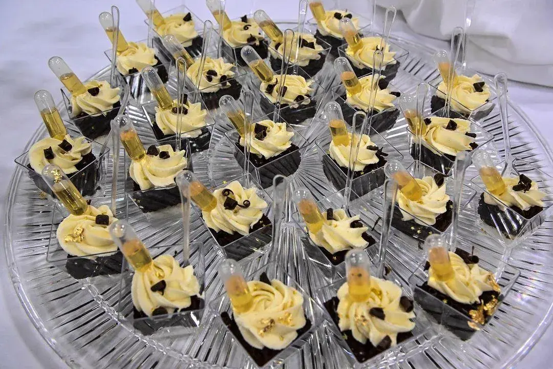 Passed appetizers presented on tasting spoons by Dragonfly Catering
