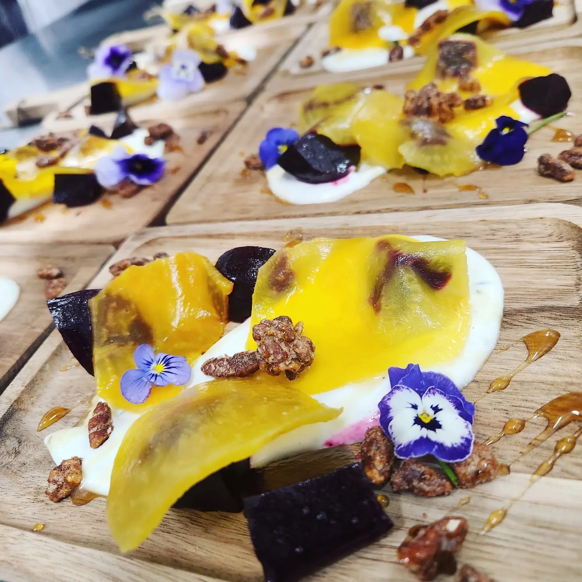 A composed seasonal course plated for a private Dragonfly dinner