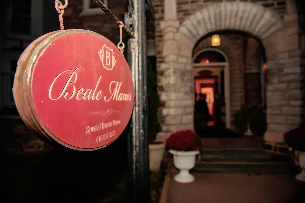 The candlelit entrance to historic Beale Manor in Parkesburg