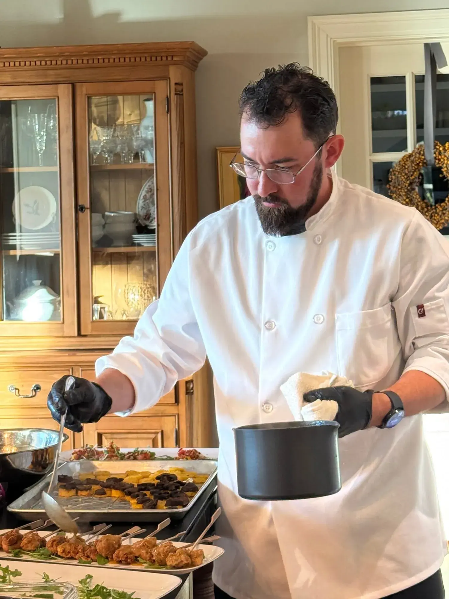 Chef Matt preparing a course during a private chef experience