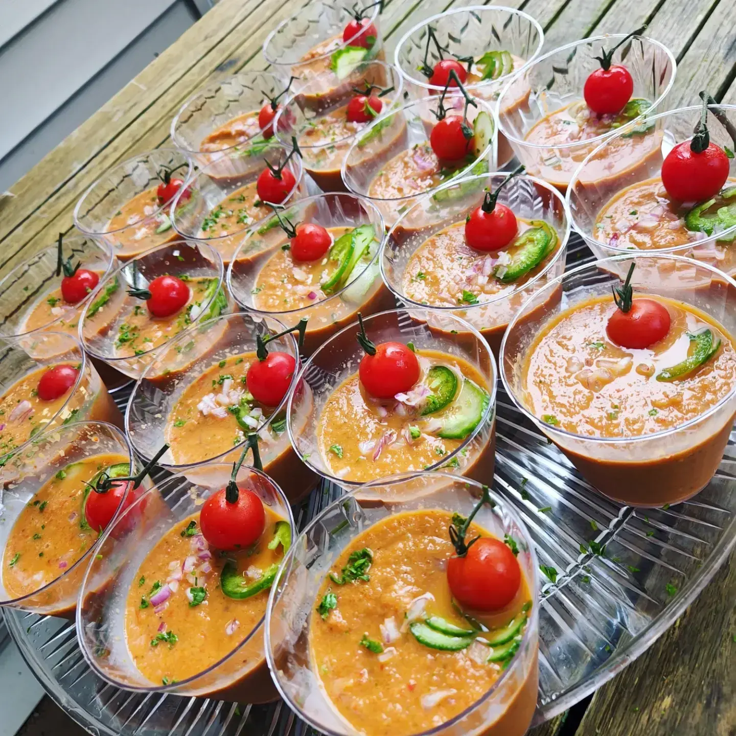Trays of tomato appetizers ready for passed service at a Dragonfly event